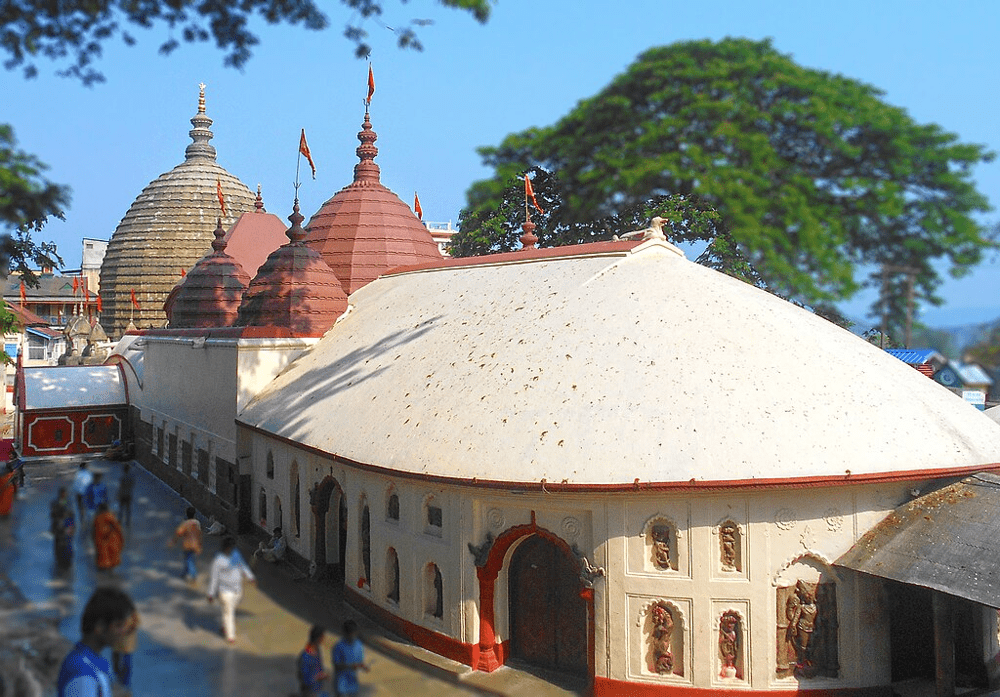 The Kamakhya Temple in Assam – a famed Shakti Peetha and Tantric shrine. While known for esoteric practices, its public worship follows Dakshinachara norms, with devotional rituals that honor the Goddess Kamakhya in an orthodox manner.